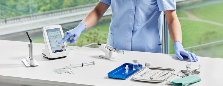 Dentist operating endodontic treatment devices with touchscreen interface for advanced root canal procedures