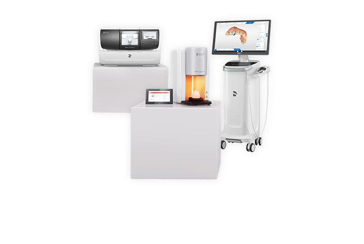 CEREC digital chairside dentistry system including intraoral scanner, milling unit, and firing furnace.